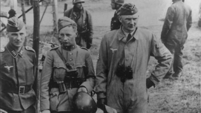 История одной фотографии: юный голландский кадет в окружении двух немецких парашютистов